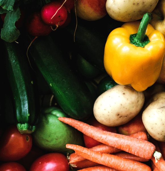 Fresh vegetables assortment, including peppers and carrots.