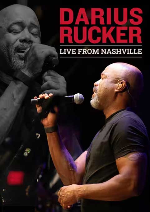 Singer performing live on stage, Nashville concert.
